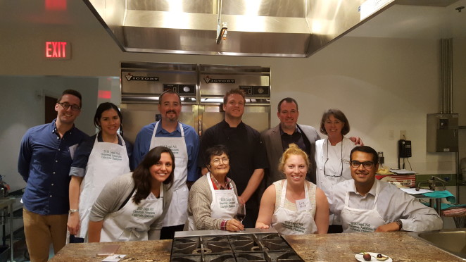 Back row, left to right: Jon Ripa, Karla Cortes, Alan Wilbur, Chef Ben Schramm, Chef Cedric Maupillier, and Chef Susan Holt. Front row, left to right: Sarah Ripa, Guity Deyhimy, Elizabeth Mickle, Ravi Sharma