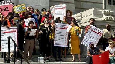 A rally on the steps of the Wilson Building