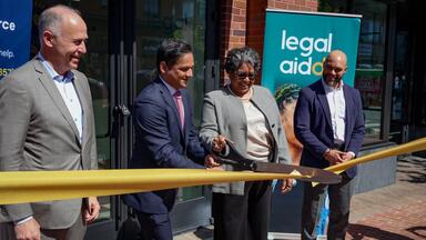 Brian Schwalb, Vikram Swaruup, Kirra Jarratt, and Robert White at ribbon cutting
