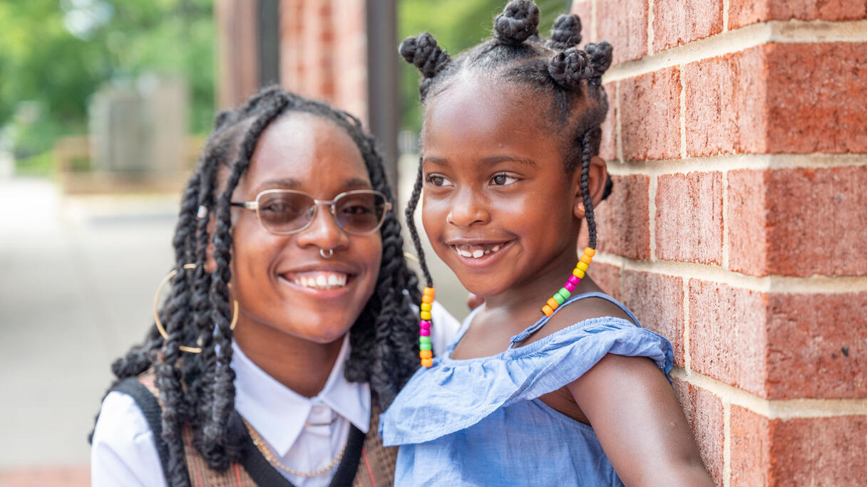 Former Legal Aid client Debra Moore and her daughter