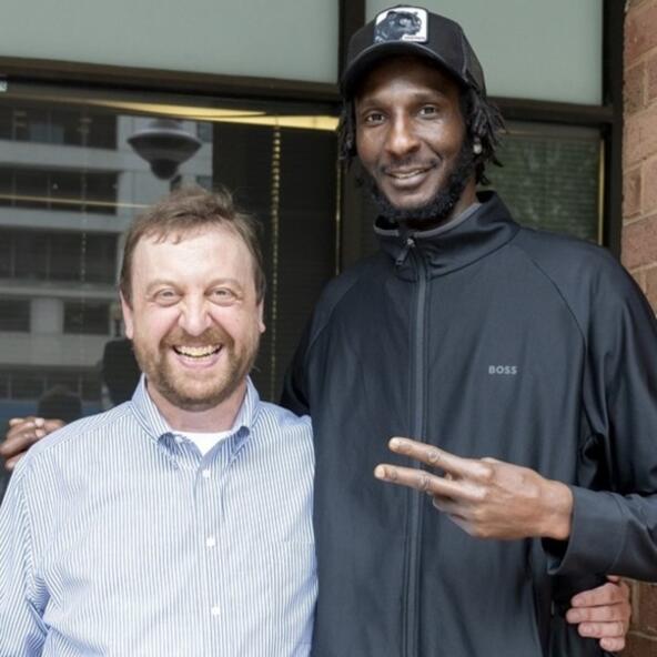 Legal Aid DC housing client Ricky McComb with his attorney Brian Rohal