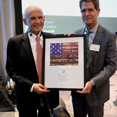 Judge David Tatel and John Relman with the Servant of Justice Award