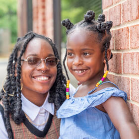 Former Legal Aid client Debra Moore and her daughter