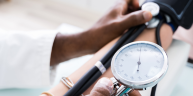 A patient gets their blood pressure taken