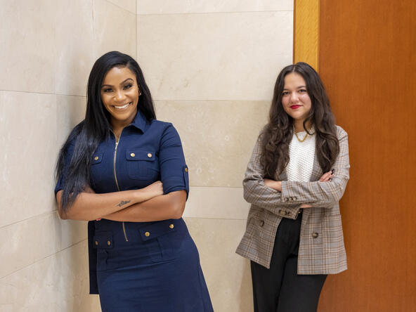 Legal Aid client Candy Page with her attorney Kalena Kettering of Groom Law Group