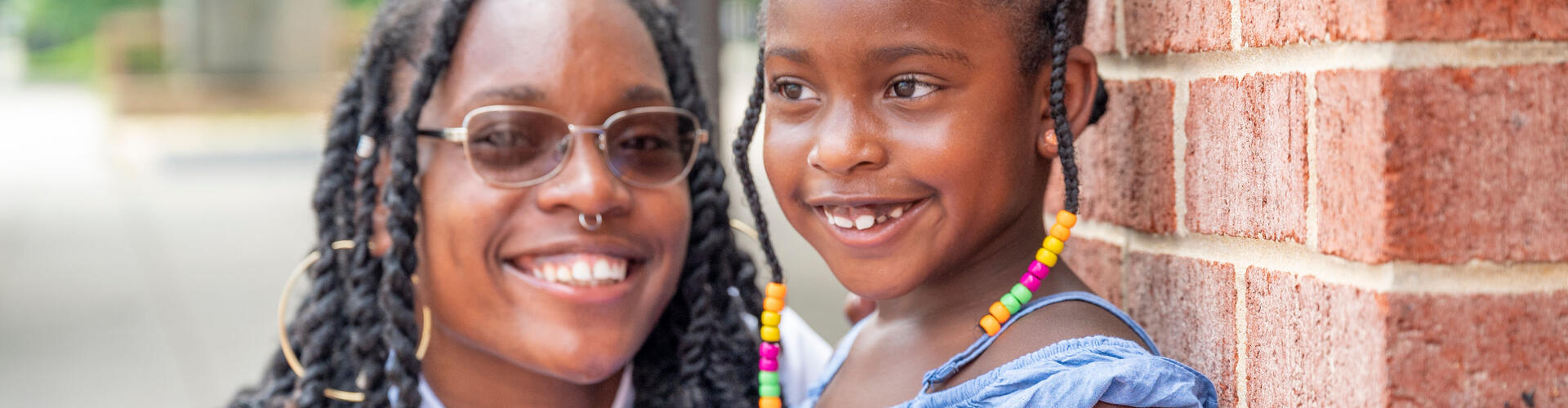 Former Legal Aid client Debra Moore and her daughter