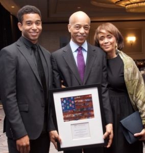 Tom with his son Tommy and his wife Shelley Brazier